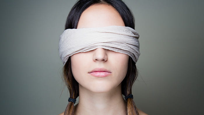 A woman blindfolded