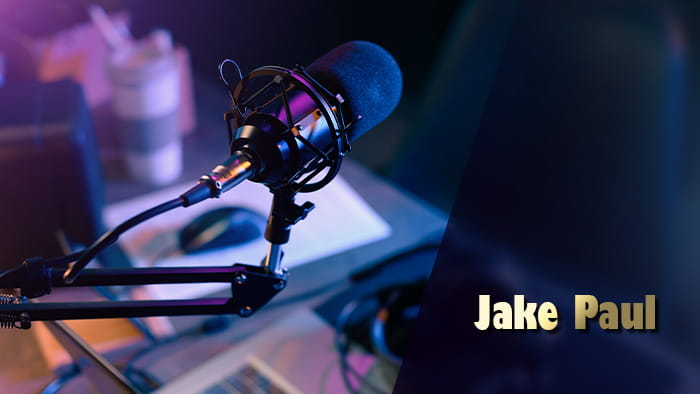 A streaming microphone at a desk and Jake Paul's name