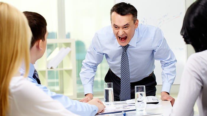 Man screaming in a meeting
