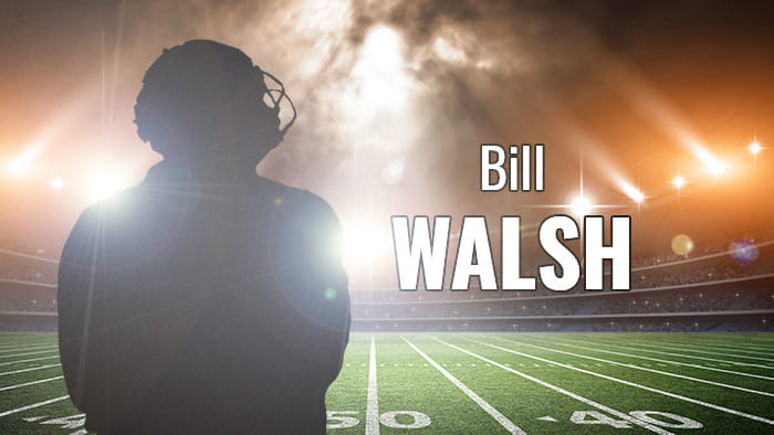 A silhouette representing Bill Walsh in a football stadium