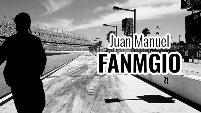 A silhouette representing Juan Manuel Fangio at a race track