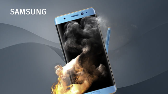 A charred Samsung Galaxy Note 7 amidst smoke