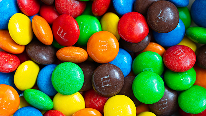A vibrant mix of M&M's candies in various colors