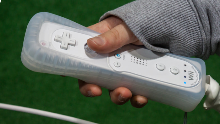 Nintendo Wii with its innovative motion-sensing controllers, symbolizing its revolutionary impact on gaming
